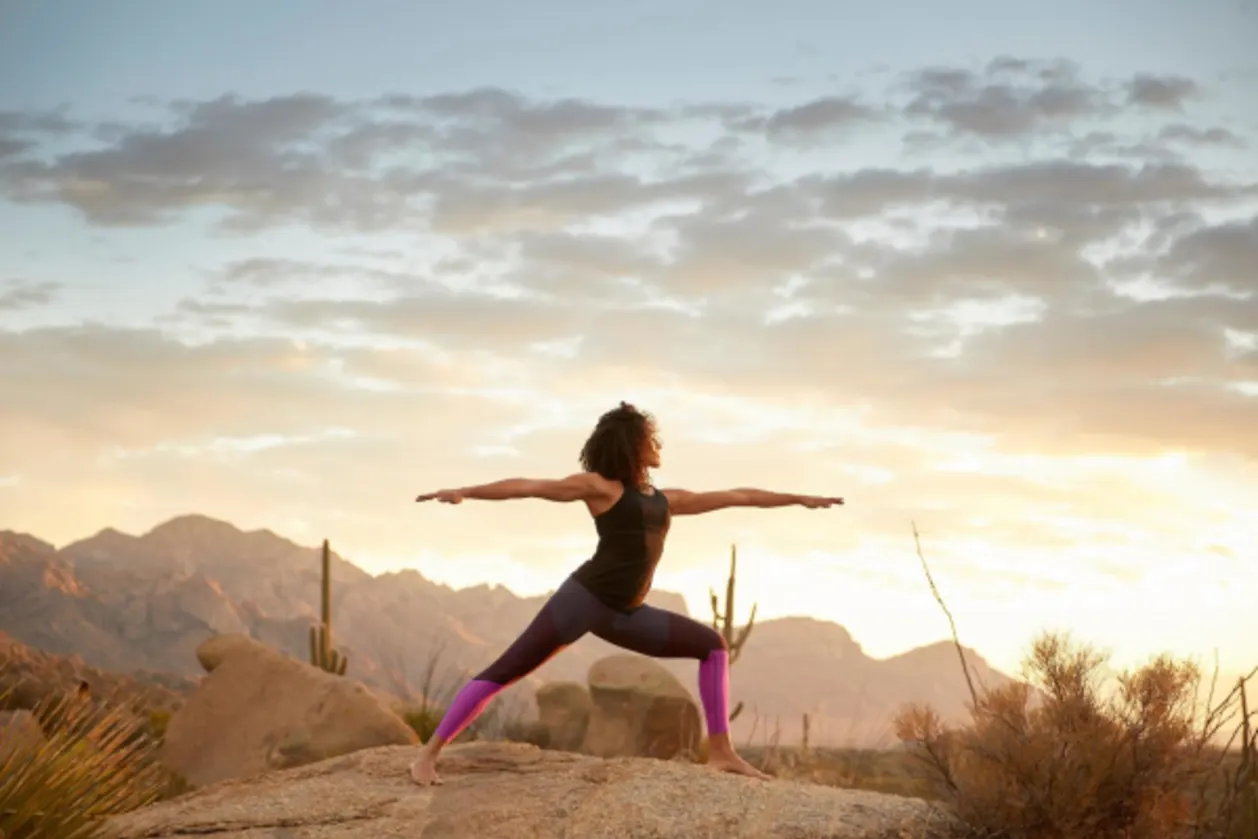 Miraval Arizona Resort & Spa Tucson woman doing yoga outdoors
